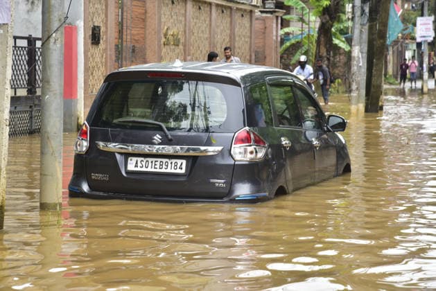 Heavy rainfall in India s Guwahati GUWAHATI, INDIA - AUGUST 19: A car submerged in floodwater is seen following heavy rainfall in Guwahati, Assam state, India, on August 19, 2026. The severe monsoon downpour triggered widespread flash flooding and waterlogging across multiple neighborhoods, disrupting normal life and forcing residents to use makeshift watercraft and boats for daily transportation. Hafiz Ahmed Anadolu Guwahati India. Editorial use only. Please get in touch for any other usage.  Copyright: x2026xAnadoluxHafizxAhmedx
