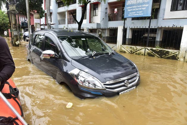 Heavy rainfall in India s Guwahati GUWAHATI, INDIA - AUGUST 19: A car submerged in floodwater is seen following heavy rainfall in Guwahati, Assam state, India, on August 19, 2026. The severe monsoon downpour triggered widespread flash flooding and waterlogging across multiple neighborhoods, disrupting normal life and forcing residents to use makeshift watercraft and boats for daily transportation. Hafiz Ahmed Anadolu Guwahati India. Editorial use only. Please get in touch for any other usage.  Copyright: x2026xAnadoluxHafizxAhmedx