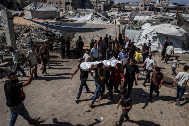 Funeral ceremony for those killed in an Israeli attack on a cafe in Gaza City GAZA CITY, GAZA, PALESTINE - AUGUST 19: Citizens and relatives of the Palestinians, killed in an Israeli drone strike targeting a beachfront cafe in the port area west of Gaza City, attend the funeral prayer at Al-Shifa Hospital in Gaza City, Gaza, Palestine on August 19, 2026. At least six Palestinians, including a child, were killed and more than 14 others injured when an Israeli unmanned aerial vehicle (UAV) fired missiles at the crowded cafe, despite calls from U.S. President Donald Trump for Israel to cease attacks in the enclave. Following the completion of funeral rites at the hospital, the victims were taken for burial by their mourning families. Ali Jadal  Copyright: x2026xAnadoluxAlixJadallahx