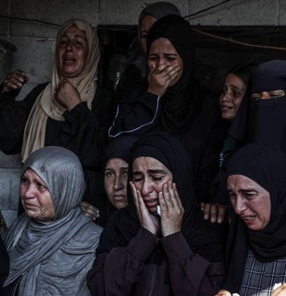 Funeral ceremony for those killed in an Israeli attack on a cafe in Gaza City GAZA CITY, GAZA, PALESTINE - AUGUST 19: Relatives of the Palestinians, killed in an Israeli drone strike targeting a beachfront cafe in the port area west of Gaza City, mourn during the funeral prayer at Al-Shifa Hospital in Gaza City, Gaza, Palestine on August 19, 2026. At least six Palestinians, including a child, were killed and more than 14 others injured when an Israeli unmanned aerial vehicle (UAV) fired missiles at the crowded cafe, despite calls from U.S. President Donald Trump for Israel to cease attacks in the enclave. Following the completion of funeral rites at the hospital, the victims were taken for burial by their mourning families. Ali Jadallah A  Copyright: x2026xAnadoluxAlixJadallahx