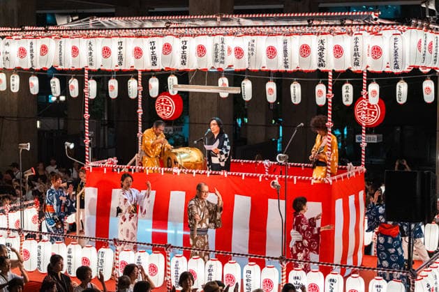 General view, August 19, 2026 - Participants dance around a yagura during the 54th Kitamido Bon Odori in Osaka, Japan. Held at Hongwanji Tsumura Betsuin (Kitamido), the annual summer festival brings together local residents and visitors for traditional Bon Odori, Kawachi Ondo performances, and evening festivities.  aflo_341483870