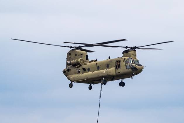 Chinook helicopter pictured on the Spa airfield near on the site of the fire in the Hautes Fagnes (High Fens) nature reserve, on Wednesday 19 August 2026. The fire started on August 14th and 3000 hectares (on a total of 4500) are impacted.  BRUNOxFAHY 183773387