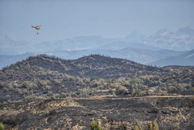 CECOPI Approves the Relocation of Residents from Seven Towns Affected by the Riglos Fire in Huesca View of areas scorched by the Riglos fire, as of August 19, 2026, in Huesca, Aragon, Spain. The Integrated Operational Coordination Center (CECOPI) agreed, at its meeting on Tuesday, August 18, to relocate, this Wednesday, August 19, of residents from the towns of Villalangua, Salinas de Jaca, Santa María de la Pena, Bailo, Arbués, Alastuey, and Arrués, who were evacuated days earlier due to the wildfire that, since August 10, has burned 18,400 hectares in the area around Las Penas de Riglos. Huesca, August 19, 2026. Veró, Huesca, Aragon. Huesca, Aragon, Spain  Copyright: xVeronicaxLacasax 7720912