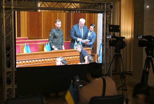 Recently appointed Ukrainian Minister of Defence Yevhenii Khmara and recently appointed Minister of Foreign Affairs of Ukraine Andrii Sybiha (L to R) stand in the government stall during a sitting of the Verkhovna Rada, broadcast for the media at the press centre of the Ukrainian Parliament, Kyiv, Ukraine, August 19, 2026. The Verkhovna Rada approved President Volodymyr Zelenskyy’s nomination of Khmara as Defence Minister, with 312 lawmakers voting in favour. Khmara, a Major General of the Security Service of Ukraine (SSU) and special operations officer, served for more than 15 years in the SSU’s Special Operations Centre A (Alpha). During the full-scale war, he took part in combat operations, including the liberation of Kyiv region, fighti  Copyright: xYevhenxKotenkox
