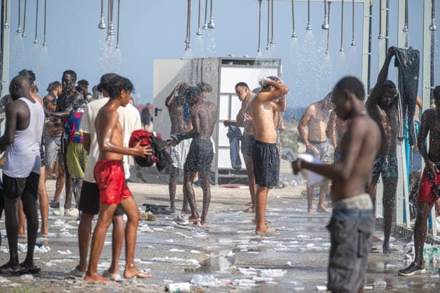 The humanitarian crisis in Ceuta continues. Migrants camped on Trampolín Beach, August 19, 2026, in Ceuta, Spain. Ceuta continues to face a serious humanitarian crisis following the historic mass influx of more than 70,000 migrants who swam across the Tarajal on July 30 and 31. Although the current police deployment and border reinforcement by Moroccan authorities have succeeded in curbing the influx, the autonomous city continues to face a serious humanitarian, health, and security crisis. August 19, 2026, Spain  Copyright: xMarcosxMorenox 7721079
