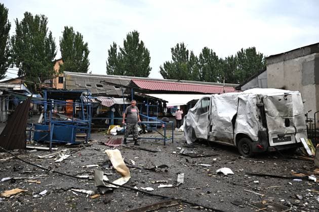 A man walks among the rubble at the central market, damaged by a Russian attack, Zaporizhzhia, Ukraine, August 19, 2026. Overnight, the Russian army struck the south-eastern Ukrainian city with drones, destroying a hostel, a shopping centre, and the central market. (Photo by Dmytro Smolienko Ukrinform) Russian drones attack central market in Zaporizhzhia  Copyright: xDmytroxSmolienkox
