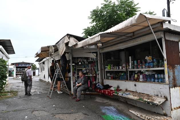 A woman sells goods at the central market, damaged by a Russian attack, Zaporizhzhia, Ukraine, August 19, 2026. Overnight, the Russian army struck the south-eastern Ukrainian city with drones, destroying a hostel, a shopping centre, and the central market. (Photo by Dmytro Smolienko Ukrinform) Russian drones attack central market in Zaporizhzhia  Copyright: xDmytroxSmolienkox