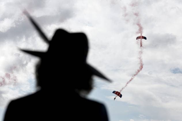 . 19 08 2026. York, United Kingdom. Queen Camilla watches the Falcons Parachute Display team during a visit to the Ebor Festival at York Racecourse, United Kingdom.  xPoolx xi-Imagesx IIM-26955-0028