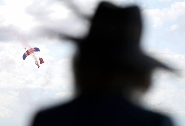 . 19 08 2026. York, United Kingdom. Queen Camilla watches the Falcons Parachute Display team during a visit to the Ebor Festival at York Racecourse, United Kingdom.  xPoolx xi-Imagesx IIM-26955-0032