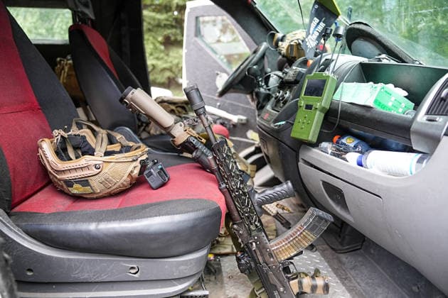 August 19, 2026, Serhiivka, Donetsk Oblast, Ukraine: A gun and a helmet are seen inside a van carrying civilians evacuated by the Ã¢â‚¬oeWhite AngelsÃ¢â‚¬Â crew from the village of Serhiivka, east of Kramatorsk, in the Donbas region, Ukraine, on August 19, 2026. The White Angels crew, composed of police officers, evacuate people from the frontline towns and villages. Serhiivka Ukraine - ZUMAa252 20260819_zip_a252_013 Copyright: xDavidxAllignonx