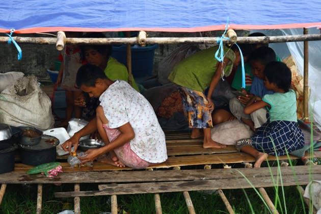 August 19, 2026, Ngathaingchaung, Ayeyarwady Division, Myanmar: Displaced residents in Ngathaingchaung Township, Ayeyarwady Region, build temporary shelters on a levee after homes were submerged by flooding..In Laymyethna Township, Ayeyarwady Region, the Ngawun River embankment collapsed on July 31, leaving nearby towns including Hinthada, Yegyi, Ngathaingchaung, Kyonpyaw and Kyaunggon still inundated, affecting tens of thousands of people, officials said. Ngathaingchaung Myanmar  - ZUMAn324 20260819_zip_n324_004 Copyright: xAyexMyaxNaingx