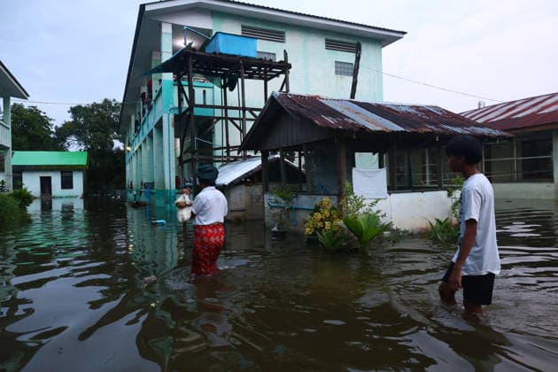 August 19, 2026, Ngathaingchaung, Ayeyarwady Division, Myanmar: Homes are submerged by floodwaters in Ngathaingchaung Township, Ayeyarwady Region..In Laymyethna Township, Ayeyarwady Region, the Ngawun River embankment collapsed on July 31, leaving nearby towns including Hinthada, Yegyi, Ngathaingchaung, Kyonpyaw and Kyaunggon still inundated, affecting tens of thousands of people, officials said. Ngathaingchaung Myanmar  - ZUMAn324 20260819_zip_n324_011 Copyright: xAyexMyaxNaingx