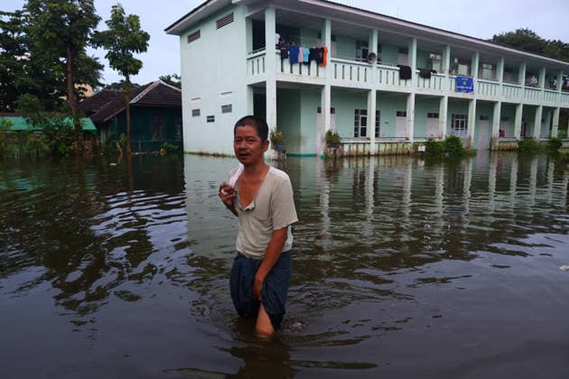 August 19, 2026, Ngathaingchaung, Ayeyarwady Division, Myanmar: Homes are submerged by floodwaters in Ngathaingchaung Township, Ayeyarwady Region..In Laymyethna Township, Ayeyarwady Region, the Ngawun River embankment collapsed on July 31, leaving nearby towns including Hinthada, Yegyi, Ngathaingchaung, Kyonpyaw and Kyaunggon still inundated, affecting tens of thousands of people, officials said. Ngathaingchaung Myanmar  - ZUMAn324 20260819_zip_n324_013 Copyright: xAyexMyaxNaingx