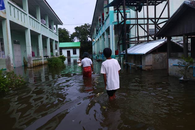 August 19, 2026, Ngathaingchaung, Ayeyarwady Division, Myanmar: Homes are submerged by floodwaters in Ngathaingchaung Township, Ayeyarwady Region..In Laymyethna Township, Ayeyarwady Region, the Ngawun River embankment collapsed on July 31, leaving nearby towns including Hinthada, Yegyi, Ngathaingchaung, Kyonpyaw and Kyaunggon still inundated, affecting tens of thousands of people, officials said. Ngathaingchaung Myanmar  - ZUMAn324 20260819_zip_n324_014 Copyright: xAyexMyaxNaingx