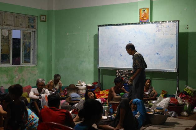 August 19, 2026, Ngathaingchaung, Ayeyarwady Division, Myanmar: Women and children, along with a few men, stay at a flood relief camp in Ngathaingchaung Township, Ayeyarwady Region..In Laymyethna Township, Ayeyarwady Region, the Ngawun River embankment collapsed on July 31, leaving nearby towns including Hinthada, Yegyi, Ngathaingchaung, Kyonpyaw and Kyaunggon still inundated, affecting tens of thousands of people, officials said. Ngathaingchaung Myanmar  - ZUMAn324 20260819_zip_n324_016 Copyright: xAyexMyaxNaingx