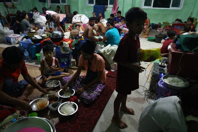 August 19, 2026, Ngathaingchaung, Ayeyarwady Division, Myanmar: Women and children, along with a few men, stay at a flood relief camp in Ngathaingchaung Township, Ayeyarwady Region..In Laymyethna Township, Ayeyarwady Region, the Ngawun River embankment collapsed on July 31, leaving nearby towns including Hinthada, Yegyi, Ngathaingchaung, Kyonpyaw and Kyaunggon still inundated, affecting tens of thousands of people, officials said. Ngathaingchaung Myanmar  - ZUMAn324 20260819_zip_n324_023 Copyright: xAyexMyaxNaingx