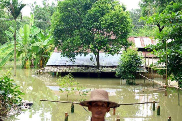 August 19, 2026, Ngathaingchaung, Ayeyarwady Division, Myanmar: Homes are submerged by floodwaters in Ngathaingchaung Township, Ayeyarwady Region..In Laymyethna Township, Ayeyarwady Region, the Ngawun River embankment collapsed on July 31, leaving nearby towns including Hinthada, Yegyi, Ngathaingchaung, Kyonpyaw and Kyaunggon still inundated, affecting tens of thousands of people, officials said. Ngathaingchaung Myanmar  - ZUMAn324 20260819_zip_n324_029 Copyright: xAyexMyaxNaingx