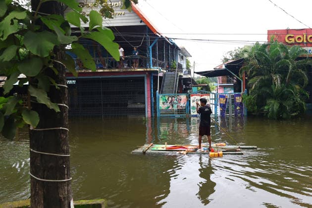 August 19, 2026, Ngathaingchaung, Ayeyarwady Division, Myanmar: People travel by boats through floodwaters in Ngathaingchaung Township, Ayeyarwady Region..In Laymyethna Township, Ayeyarwady Region, the Ngawun River embankment collapsed on July 31, leaving nearby towns including Hinthada, Yegyi, Ngathaingchaung, Kyonpyaw and Kyaunggon still inundated, affecting tens of thousands of people, officials said. Ngathaingchaung Myanmar - ZUMAn324 20260819_zip_n324_032 Copyright: xAyexMyaxNaingx