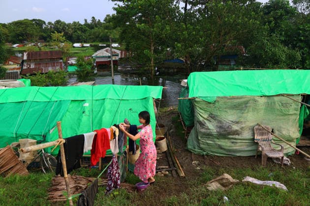 August 19, 2026, Ngathaingchaung, Ayeyarwady Division, Myanmar: Displaced residents in Ngathaingchaung Township, Ayeyarwady Region, build temporary shelters on a levee after homes were submerged by flooding..In Laymyethna Township, Ayeyarwady Region, the Ngawun River embankment collapsed on July 31, leaving nearby towns including Hinthada, Yegyi, Ngathaingchaung, Kyonpyaw and Kyaunggon still inundated, affecting tens of thousands of people, officials said. Ngathaingchaung Myanmar  - ZUMAn324 20260819_zip_n324_046 Copyright: xAyexMyaxNaingx
