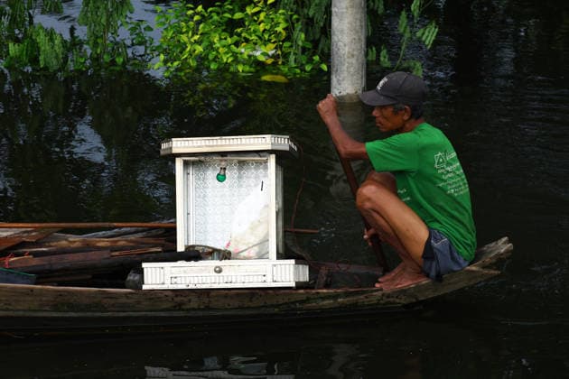 August 19, 2026, Ngathaingchaung, Ayeyarwady Division, Myanmar: People travel by boats through floodwaters in Ngathaingchaung Township, Ayeyarwady Region..In Laymyethna Township, Ayeyarwady Region, the Ngawun River embankment collapsed on July 31, leaving nearby towns including Hinthada, Yegyi, Ngathaingchaung, Kyonpyaw and Kyaunggon still inundated, affecting tens of thousands of people, officials said. Ngathaingchaung Myanmar - ZUMAn324 20260819_zip_n324_051 Copyright: xAyexMyaxNaingx