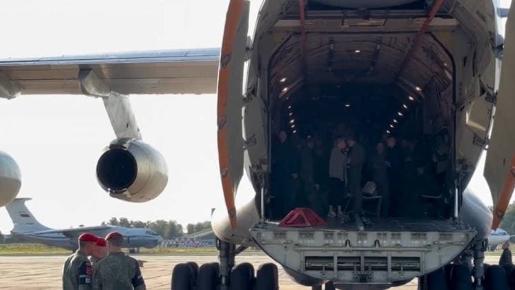 BELARUS - AUGUST 19, 2026: Russian servicemen released from Ukrainian captivity disembark from an aircraft. Video screen grab. Best quality available. Alexei Zhukov TASS  96358288