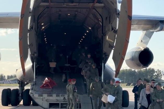 BELARUS - AUGUST 19, 2026: Russian servicemen released from Ukrainian captivity disembark from an aircraft. Video screen grab. Best quality available. Alexei Zhukov TASS  96358290