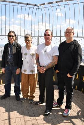 NEW YORK, NY - AUGUST 19: Weezer light the Empire State Building to Celebrate the Release of Weezer (The Gold Album) in Support of Hearts of Gold on August 19, 2026 in New York City. Copyright: xMediaPunchx