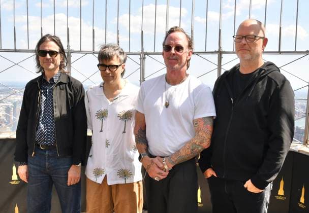 NEW YORK, NY - AUGUST 19: Weezer light the Empire State Building to Celebrate the Release of Weezer (The Gold Album) in Support of Hearts of Gold on August 19, 2026 in New York City. Copyright: xMediaPunchx