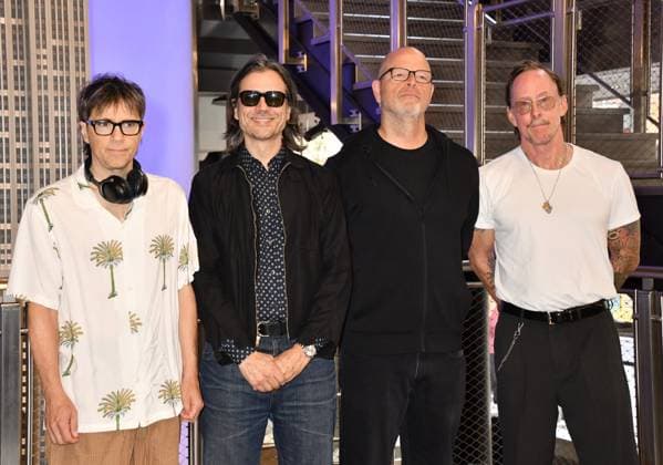 NEW YORK, NY - AUGUST 19: Weezer light the Empire State Building to Celebrate the Release of Weezer (The Gold Album) in Support of Hearts of Gold on August 19, 2026 in New York City. Copyright: xMediaPunchx