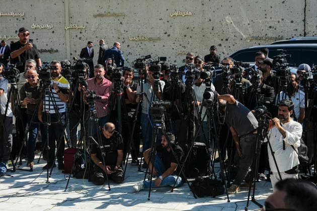 Iranian Parliament Speaker Mohammad Bagher Ghalibaf visits Iraq Journalists are pictured as Iran s Parliament Speaker Mohammad Bagher Ghalibaf (C) speaks during a press conference at the site where Qassem Soleimani, commander of the Quds Force of Iran s Islamic Revolutionary Guards Corps (IRGC), was killed by a US airstrike in 2020, near the airport, upon his arrival in Baghdad on August 19, 2026. Baghdad Baghdad Iraq Copyright: xHamedxMalekpourx