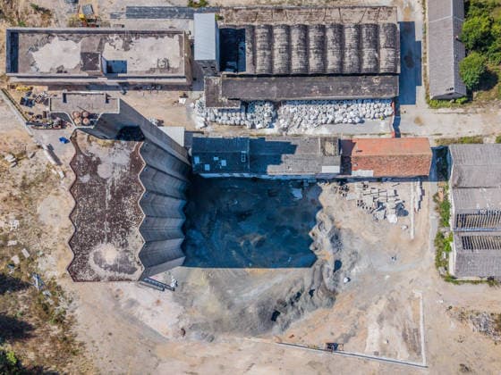 Aerial photo of Illegal hazardous waste disposal site in Gospic, Croatia Aerial photo of the illegal hazardous waste disposal site in Gospic, Croatia, on August 19, 2026. Approximately 37,000 tons of industrial and hazardous waste were illegally dumped at at an abandoned industrial complex in Gospic. Investigation details from Croatia s anti-corruption office, USKOK, outline massive environmental contamination and a network of institutional corruption.  ZvonimirxBarisin PIXSELL