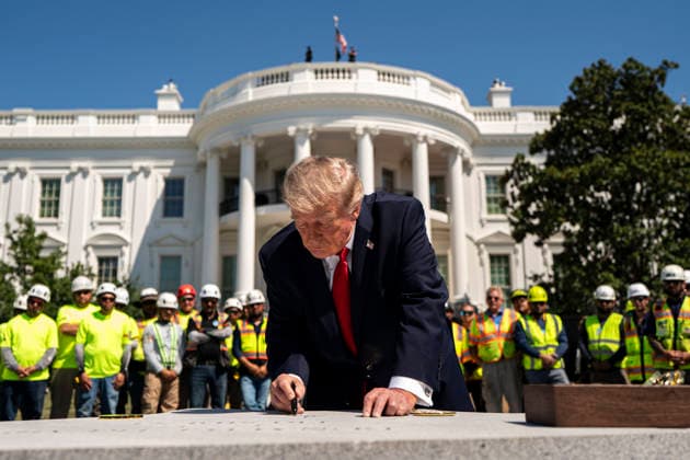 WASHINGTON, DC - AUGUST 19: US President Donald Trump signs a piece of granite that will be part of the new White House helipad on the South Lawn of the White House in Washington, DC, US, on Wednesday, Aug. 19, 2026. Copyright: xAlxDragox xPoolxviaxCNPx MediaPunchx