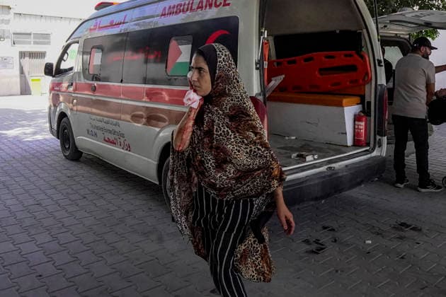 (260819) -- GAZA, Aug. 19, 2026 -- An injured woman is seen after being evacuated from the site of an Israeli airstrike, at Al-Shifa hospital, in Gaza City, on Aug. 19, 2026. At least nine Palestinians, including a woman, were killed Wednesday in an Israeli airstrike targeting a Hamas-run municipal police headquarters in central Gaza City, according to Palestinian sources. Sources and witnesses said the airstrike caused a large explosion and scattered shrapnel around the headquarters, which is surrounded by tents housing displaced people. (Photo by Xinhua) MIDEAST-GAZA CITY-AIRSTRIKE RizekxAbdeljawad 