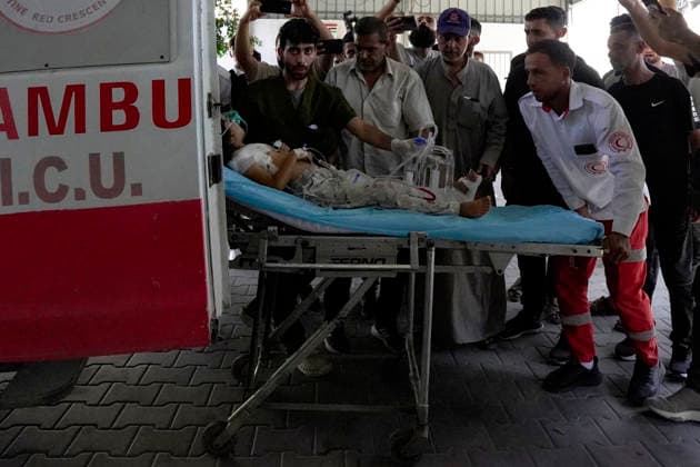 (260819) -- GAZA, Aug. 19, 2026 -- An injured child is seen after being evacuated from the site of an Israeli airstrike, at Al-Shifa hospital, in Gaza City, on Aug. 19, 2026. At least nine Palestinians, including a woman, were killed Wednesday in an Israeli airstrike targeting a Hamas-run municipal police headquarters in central Gaza City, according to Palestinian sources. Sources and witnesses said the airstrike caused a large explosion and scattered shrapnel around the headquarters, which is surrounded by tents housing displaced people. (Photo by Xinhua) MIDEAST-GAZA CITY-AIRSTRIKE RizekxAbdeljawad 