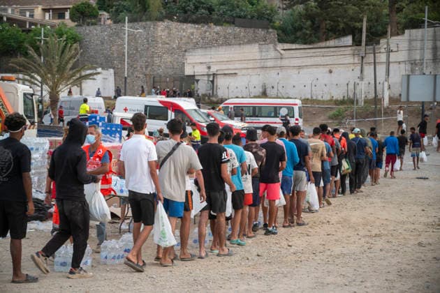 The humanitarian crisis in Ceuta continues. Several migrants on a beach, August 19, 2026, in Ceuta, Spain. Ceuta continues to face a serious humanitarian crisis following the historic mass influx of more than 70,000 migrants who swam across the Tarajal on July 30 and 31. Although the current police deployment and border reinforcement by by Moroccan authorities have managed to stem the influx, the autonomous city continues to face a serious humanitarian crisis, health, and security crises. AUGUST 19, 2026 CEUTA MIGRATION CRISIS MIGRANTS IMMIGRANTS TRAMPOLÍN TARAJAL BENÍTEZ BEACH Ceuta Ceuta, Spain  Copyright: xMarcosxMorenox 7721815