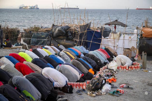 The humanitarian crisis in Ceuta continues. Several migrants pray on a beach on August 19, 2026, in Ceuta, Spain. Ceuta continues to face a serious humanitarian crisis following the historic mass influx of more than 70,000 migrants who swam across the Tarajal Strait on July 30 and 31. Although the police deployment and border reinforcement by by Moroccan authorities have managed to stem the influx, the autonomous city continues to face a serious humanitarian crisis, health, and security crises. AUGUST 19, 2026 CEUTA MIGRATION CRISIS MIGRANTS IMMIGRANTS TRAMPOLÍN TARAJAL PLAYA BENÍTEZ Ceuta Ceuta, Spain  Copyright: xMarcosxMorenox 7721847
