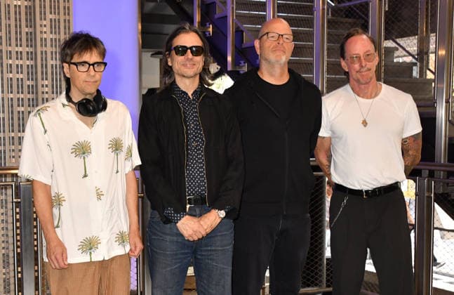 NEW YORK, NY - AUGUST 19: Weezer light the Empire State Building to Celebrate the Release of Weezer (The Gold Album) in Support of Hearts of Gold on August 19, 2026 in New York City. Copyright: xmpi099 MediaPunchx