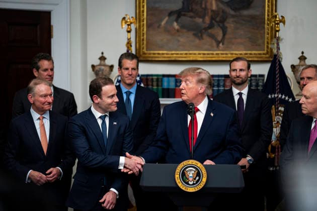 Trump Meets Technology Leaders WASHINGTON, DC - AUGUST 19: US President Donald Trump shakes hands with Michael Selig, chair of the Commodity Futures Trading Commission (CFTC), during a meeting with technology leaders in the Roosevelt Room of the White House in Washington, DC, US, on Wednesday, Aug. 19, 2026. Credit: CNP AdMedia Washington District of Columbia United States of America EDITORIAL USE ONLY  Copyright: xx CNPx xAdMediax admphotosthree012076