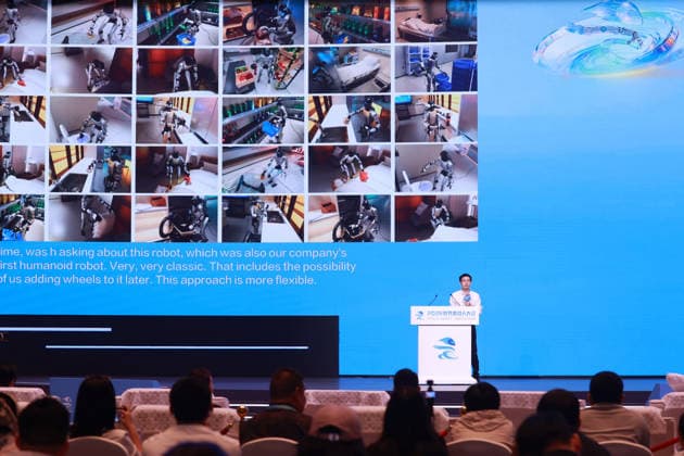 BEIJING, CHINA - AUGUST 20: Wang Xingxing, founder of Unitree Robotics, delivers a keynote speech during the main forum of the 2026 World Robot Conference on August 20, 2026 in Beijing, China. Themed Human-Robot Symbiosis, Production-Demand Convergence, the 2026 edition of the conference kicked off in Beijing on August 19.  Copyright: xVCGx 111661010143
