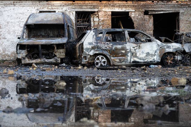 Ukraine says 12 people killed, 33 injured in Russia s overnight strike on Kyiv KYIV, UKRAINE - AUGUST 20: Burned-out vehicles and a damaged building are seen following an overnight Russian attack on Kyiv, Ukraine, on August 20, 2026. Based on preliminary information provided by Kyiv Mayor Vitali Klitschko, at least 12 people were killed and 33 others wounded, while the Darnytskyi, Sviatoshynskyi and Solomianskyi districts sustained damage. Stringer Anadolu Kyiv Ukraine. Editorial use only. Please get in touch for any other usage.  Copyright: x2026xAnadoluxStringerx