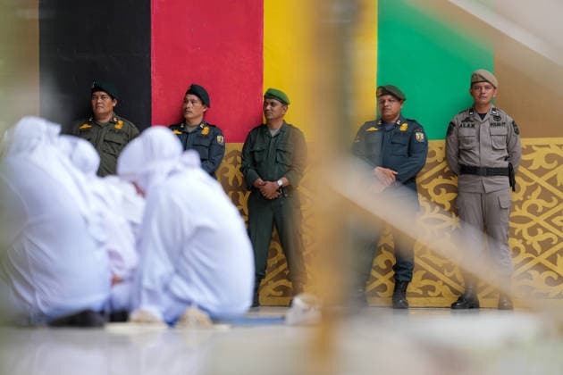 August 20, 2026, Banda Aceh, Aceh, Indonesia: Officials oversaw the smooth conduct of public caning punishments at Bustanul Salatin Park in Banda Aceh, Aceh Province, Indonesia, on Thursday. Eleven convicted individuals were publicly flogged for various offensesÃ¢â‚¬ranging from gambling and being alone with a non-lawful partner to adulteryÃ¢â‚¬receiving punishments that varied from 7, 10, and 22 lashes up to 100 lashes. Banda Aceh Indonesia - ZUMAi115 20260820_zip_i115_005 Copyright: xMuhammadxIqbalx