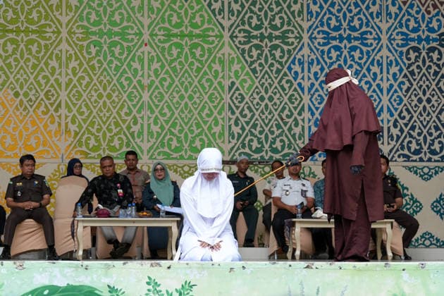 August 20, 2026, Banda Aceh, Aceh, Indonesia: A convict found guilty of violating Sharia law underwent a public caning at Bustanul Salatin Park in Banda Aceh, Aceh Province, Indonesia, on Thursday. A total of 11 individuals were publicly caned for various offensesÃ¢â‚¬ranging from gambling and being alone with a non-marital partner to adulteryÃ¢â‚¬receiving punishments that varied from 7, 10, and 22 to as many as 100 lashes. Banda Aceh Indonesia - ZUMAi115 20260820_zip_i115_018 Copyright: xMuhammadxIqbalx