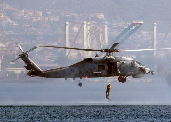TEKNOFEST Blue Homeland KOCAELI, TURKIYE - AUGUST 20: A soldier jumps from a helicopter into the sea during a military demonstration as part of the TEKNOFEST Blue Homeland at the Golcuk Naval Shipyard Command in Kocaeli, Turkiye, on August 20, 2026. Organized under the main leadership of the Turkish National Defense Ministry and the Turkish Technology Team Foundation (T3 Foundation), with Anadolu as the Global Communication Partner, the event showcases Turkiye s maritime power, defense capabilities, and indigenous technologies. Gathering technology and defense industry enthusiasts around a maritime focus, the festival will welcome visitors through August 23. Ali Atmaca Anadolu Kocaeli Turkey. Editorial use only. Please get in touch for an  Copyright: x2026xAnadoluxAlixAtmacax