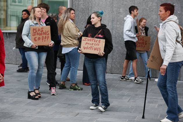 Protestors gather outside to support GrÃ gory Lenoci, before the judgment session in the trial of Gregory Lenoci, regarding the attempted murder of his neighbour Marc P., at the Namur Criminal Court, on Thursday 20 August 2026. GrÃ gory Lenoci is accused of assaulting his neighbor on 24 July 2025, following suspicions that the neighbor had sexually assaulted his stepson, leaving the victim in a vegetative state.  BRUNOxFAHY 183815931