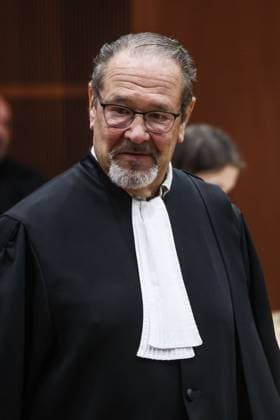 Lawyer Etienne Gras is pictured during the judgment session in the trial of Gregory Lenoci, regarding the attempted murder of his neighbour Marc P., at the Namur Criminal Court, on Thursday 20 August 2026. GrÃ gory Lenoci is accused of assaulting his neighbor on 24 July 2025, following suspicions that the neighbor had sexually assaulted his stepson, leaving the victim in a vegetative state.  BRUNOxFAHY 183816109