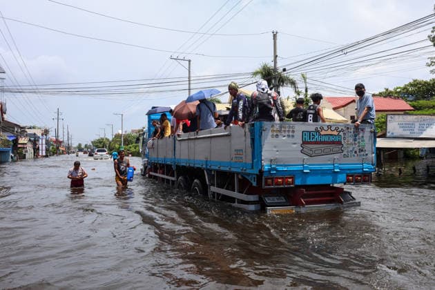 Monsoon rains flood multiple places in Philippines as tens of thousands displaced PAMPANGA, PHILIPPINES - AUGUST 20: People are evacuated on a truck from flooded areas due to monsoon rains, in Apalit, Pampanga, Philippines, on August 20, 2026. The lingering monsoon effects, compounded with the intensifying tropical storm Saudel that is expected to turn into a typhoon, have recently brought humongous rains to the Philippines, causing widespread, serious flooding in multiple areas across 10 different regions, including those on Central Luzon. As a result, tens of thousands of people across the Southeast Asian country have been displaced or evacuated to safety. Daniel Ceng Anadolu Pampanga Philippines. Editorial use only. Please get in touch  Copyright: x2026xAnadoluxDanielxCengx