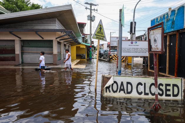 Monsoon rains flood multiple places in Philippines as tens of thousands displaced PAMPANGA, PHILIPPINES - AUGUST 20: People wade through a flooded road caused by monsoon rains, in Apalit, Pampanga, Philippines, on August 20, 2026. The lingering monsoon effects, compounded with the intensifying tropical storm Saudel that is expected to turn into a typhoon, have recently brought humongous rains to the Philippines, causing widespread, serious flooding in multiple areas across 10 different regions, including those on Central Luzon. As a result, tens of thousands of people across the Southeast Asian country have been displaced or evacuated to safety. Daniel Ceng Anadolu Pampanga Philippines. Editorial use only. Please get in touch for any othe  Copyright: x2026xAnadoluxDanielxCengx