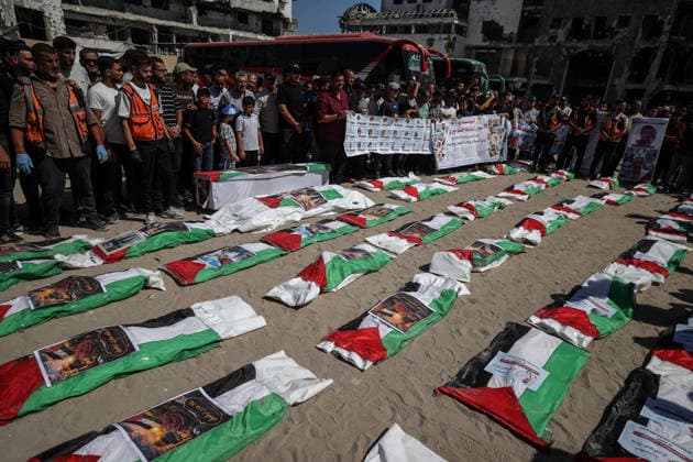 Funeral held for 50 Palestinians recovered from rubble at Al-Shifa Hospital in Gaza GAZA CITY, GAZA, PALESTINE - AUGUST 20: Relatives and local residents attend the funeral ceremony for 50 Palestinians, whose bodies were recovered from the rubble of buildings destroyed in intense Israeli bombardments, at the courtyard of Al-Shifa Medical Complex in Gaza City, Gaza, Palestine on August 20, 2026. Following extensive search and rescue operations by Palestinian Civil Defense teams, the recovered bodies were brought to the medical complex before being laid to rest by grieving families and community members. Ali Jadallah Anadolu Gaza City Gaza. Editorial use only. Please get in touch for any other usage.  Copyright: x2026xAnadoluxAlixJadallahx