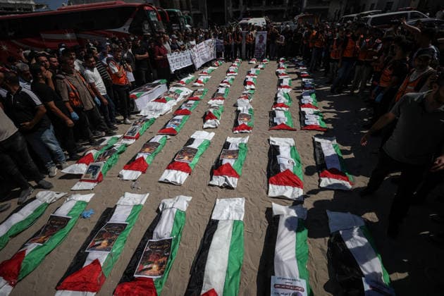 Funeral held for 50 Palestinians recovered from rubble at Al-Shifa Hospital in Gaza GAZA CITY, GAZA, PALESTINE - AUGUST 20: Relatives and local residents attend the funeral ceremony for 50 Palestinians, whose bodies were recovered from the rubble of buildings destroyed in intense Israeli bombardments, at the courtyard of Al-Shifa Medical Complex in Gaza City, Gaza, Palestine on August 20, 2026. Following extensive search and rescue operations by Palestinian Civil Defense teams, the recovered bodies were brought to the medical complex before being laid to rest by grieving families and community members. Ali Jadallah Anadolu Gaza City Gaza. Editorial use only. Please get in touch for any other usage.  Copyright: x2026xAnadoluxAlixJadallahx