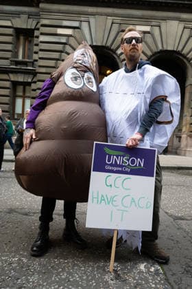 August 20, 2026, Glasgow, Scotland, UK: Members of the Unite, UNISON and GMB unions held a protest outside Glasgow City Chambers to coincide with a vote on a new pay and grading scheme for council employees. The unions claim the councils proposals would adversely affect low-paid workers, particularly women, who they say have been underpaid for two decades. Glasgow UK - ZUMAs357 20260820_zip_s357_001 Copyright: xCameronxScottx